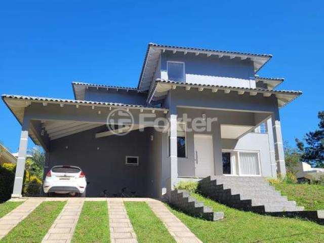 Casa em condomínio fechado com 3 quartos à venda na Estrada Capitão Gentil Machado de Godoy, 4500, Vila Elsa, Viamão, 720 m2 por R$ 1.290.000