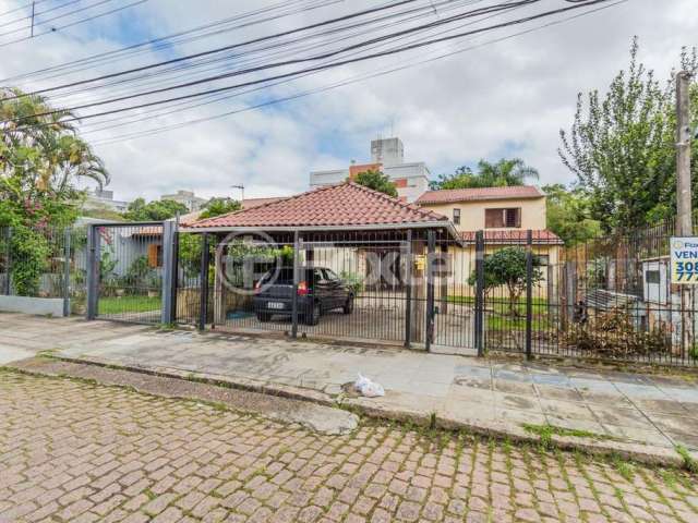 Casa com 3 quartos à venda na Rua João Maia, 76, Nonoai, Porto Alegre, 200 m2 por R$ 450.000