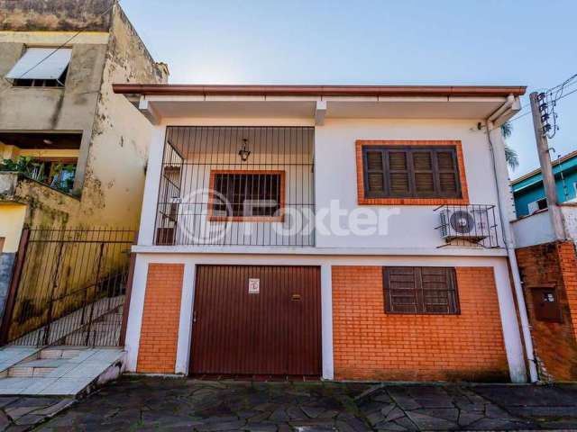 Casa com 2 quartos à venda na Rua Oito, 776, Jardim Carvalho, Porto Alegre, 200 m2 por R$ 298.000