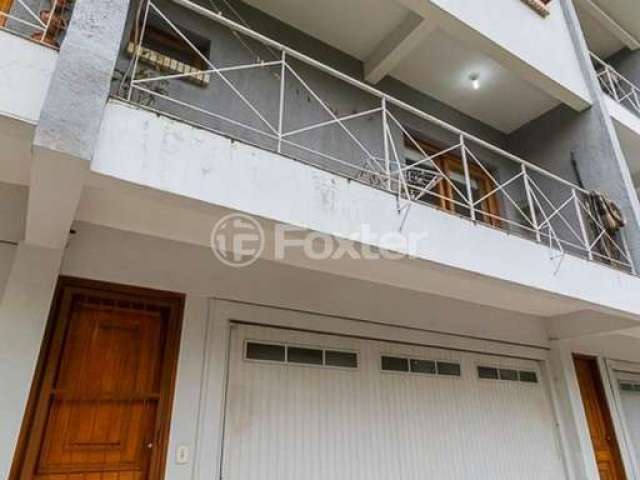 Casa em condomínio fechado com 3 quartos à venda na Rua Jamil Antônio José, 46, Nonoai, Porto Alegre, 145 m2 por R$ 590.000