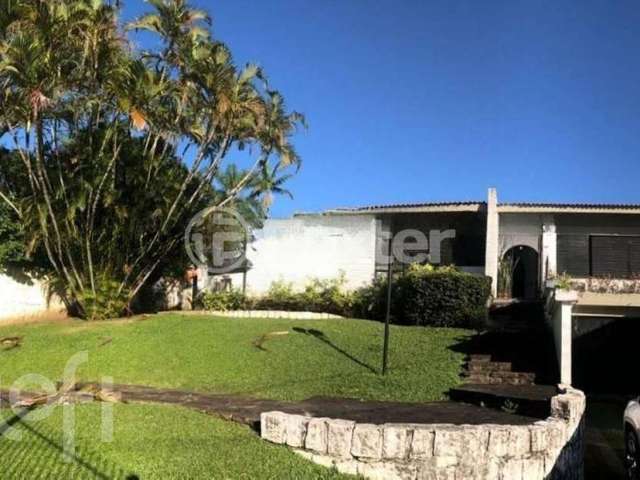 Casa com 4 quartos à venda na Avenida Jacuí, 605, Cristal, Porto Alegre, 331 m2 por R$ 2.200.000