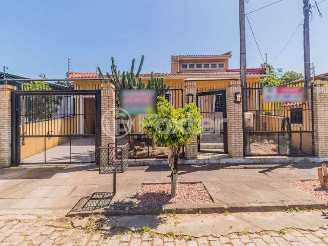 Casa com 3 quartos à venda na Rua Carmense, 165, Parque Santa Fé, Porto Alegre, 218 m2 por R$ 650.000