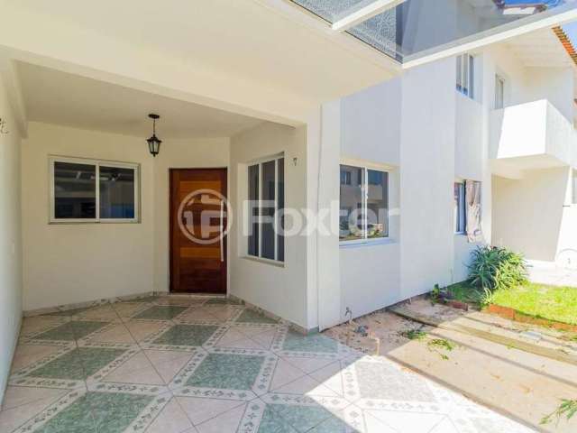 Casa em condomínio fechado com 3 quartos à venda na Avenida Prefeito Barreto Viana, 402, Cecília, Viamão, 75 m2 por R$ 276.900