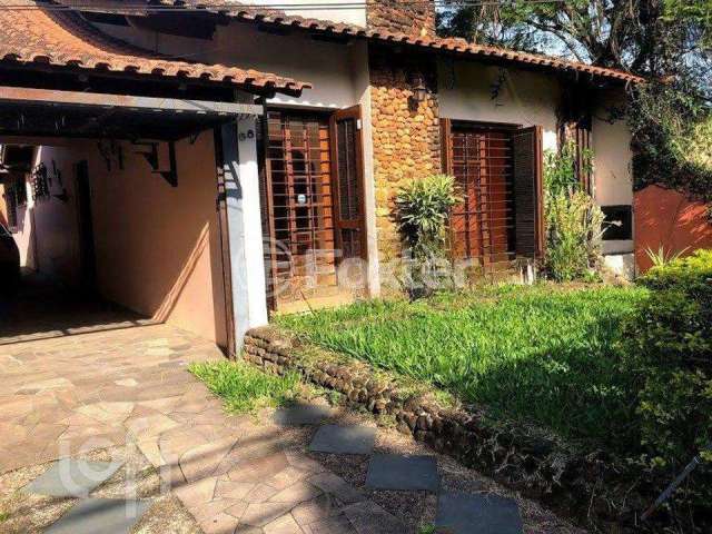 Casa com 4 quartos à venda na Rua Humberto de Campos, 68, Partenon, Porto Alegre, 280 m2 por R$ 659.000