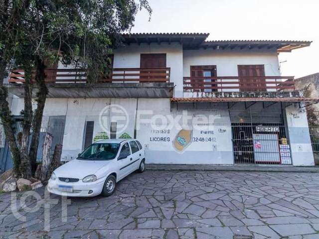 Casa com 4 quartos à venda na Avenida Eduardo Prado, 1511, Cavalhada, Porto Alegre, 350 m2 por R$ 1.395.000