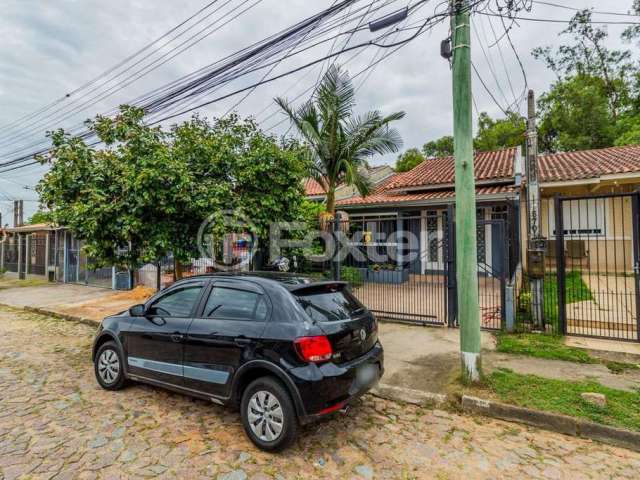 Casa com 4 quartos à venda na Rua Pedro Faria, 560, Hípica, Porto Alegre, 97 m2 por R$ 290.000