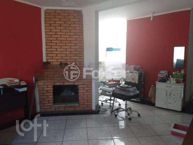 Casa com 3 quartos à venda na Rua Mata Coelho, 398, Nonoai, Porto Alegre, 74 m2 por R$ 650.000