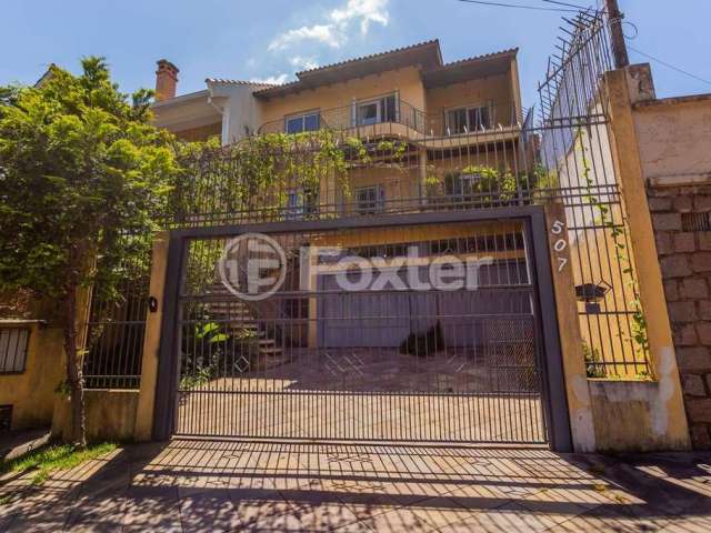 Casa com 5 quartos à venda na Rua Isidoro Tressi, 507, Jardim Botânico, Porto Alegre, 380 m2 por R$ 1.615.000