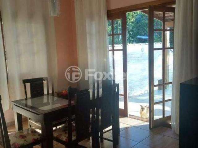 Casa com 3 quartos à venda na Avenida João Antônio Silveira, 5515, Restinga, Porto Alegre, 450 m2 por R$ 600.000