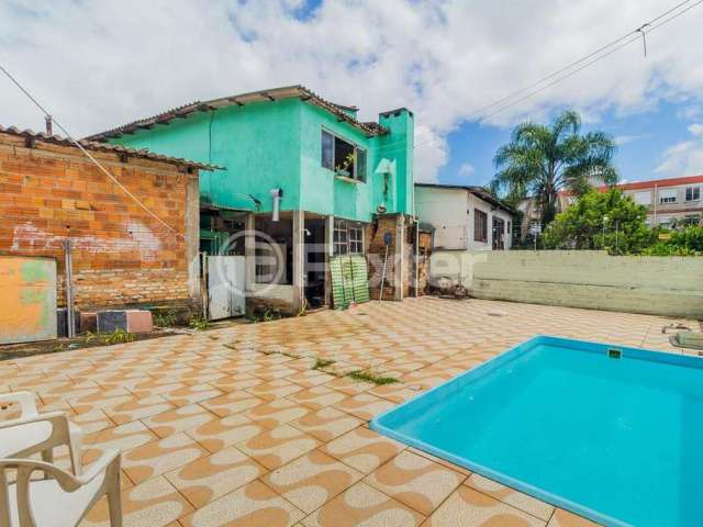 Casa com 3 quartos à venda na Rua Pedro Boticário, 780, Glória, Porto Alegre, 314 m2 por R$ 760.000