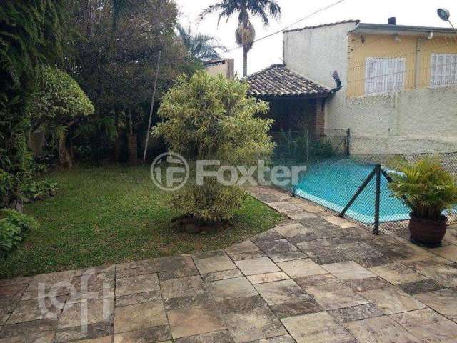 Casa com 4 quartos à venda na Rua Comendador Antônio Fontoura, 118, Cascata, Porto Alegre, 220 m2 por R$ 850.000