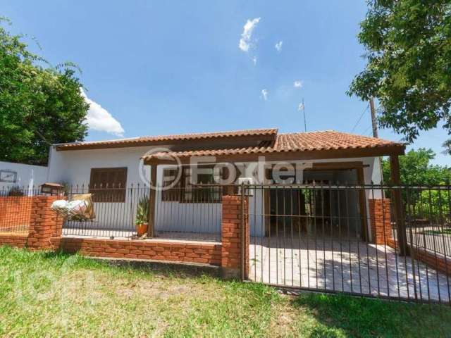 Casa com 3 quartos à venda na Rua Umbu, 21, Estância Velha, Canoas, 120 m2 por R$ 400.000