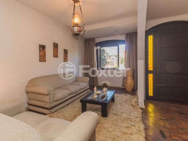 Casa com 3 quartos à venda na Avenida Vinte e Um de Abril, 82, Sarandi, Porto Alegre, 186 m2 por R$ 850.000