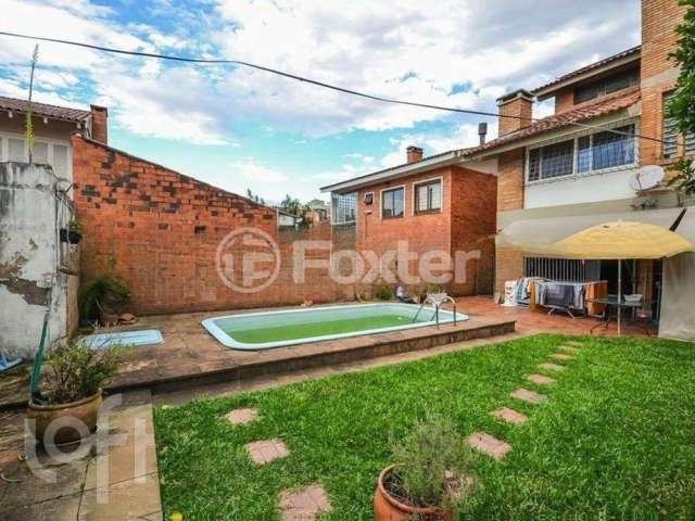 Casa com 4 quartos à venda na Rua Folha da Tarde, 194, Cristal, Porto Alegre, 300 m2 por R$ 1.400.000