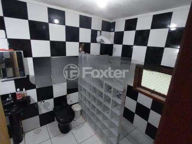 Casa com 3 quartos à venda na Rua dos Flamboaiãs, 90, Ponta Grossa, Porto Alegre, 200 m2 por R$ 371.600
