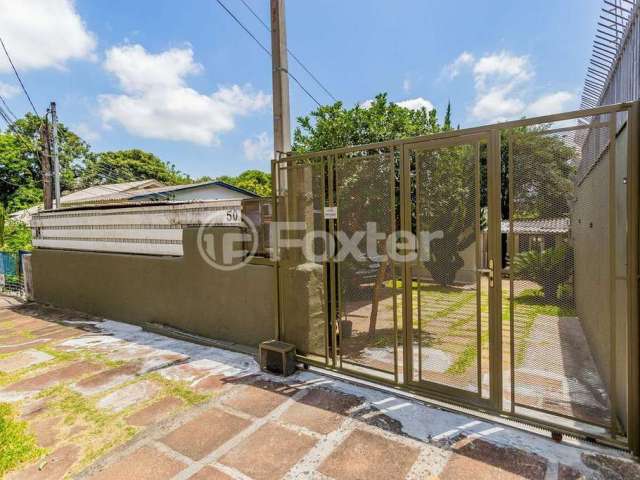 Casa com 3 quartos à venda na Rua Augusto Attílio Giordani, 50, São Sebastião, Porto Alegre, 90 m2 por R$ 575.000