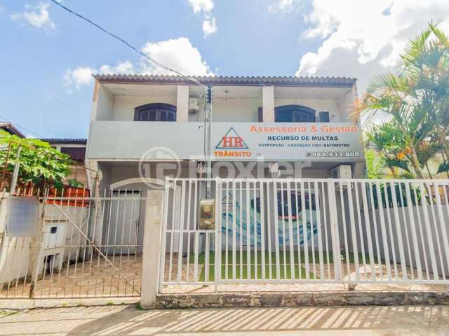 Casa com 5 quartos à venda na Avenida José Gertum, 62, Chácara das Pedras, Porto Alegre, 290 m2 por R$ 850.000