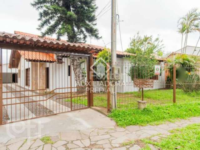 Casa com 4 quartos à venda na Avenida Guarujá, 199, Guarujá, Porto Alegre, 226 m2 por R$ 580.000