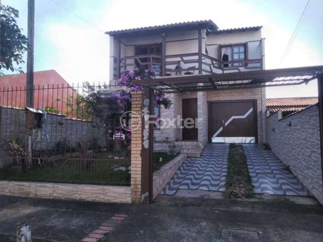 Casa com 3 quartos à venda na Rua Condores, 565, Jardim Algarve, Alvorada, 170 m2 por R$ 508.800