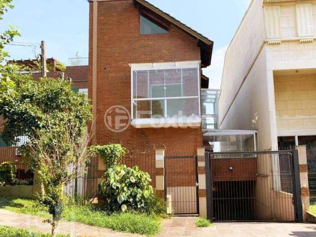 Casa em condomínio fechado com 3 quartos à venda na Rua São Leopoldo, 67, Vila Jardim, Porto Alegre, 170 m2 por R$ 519.000