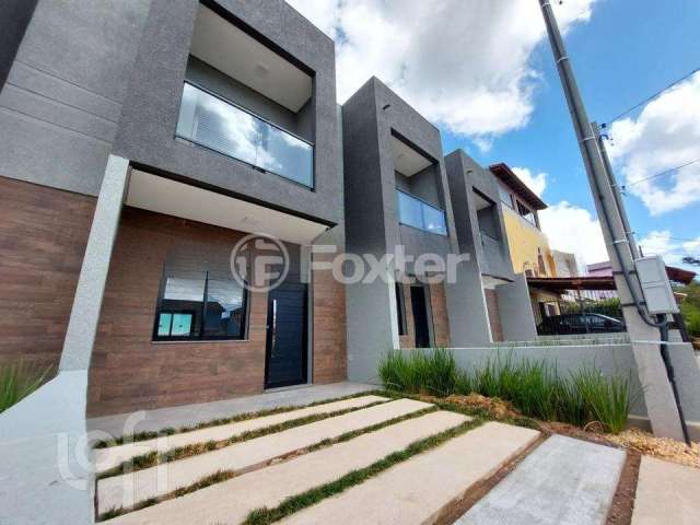 Casa com 2 quartos à venda na Rua Baldoino Bottini, 89, Hípica, Porto Alegre, 69 m2 por R$ 350.000