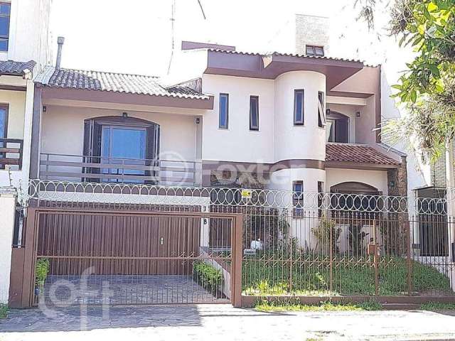 Casa com 4 quartos à venda na Rua Maestro Salvador Campanella, 128, Jardim Itu Sabará, Porto Alegre, 360 m2 por R$ 1.500.000