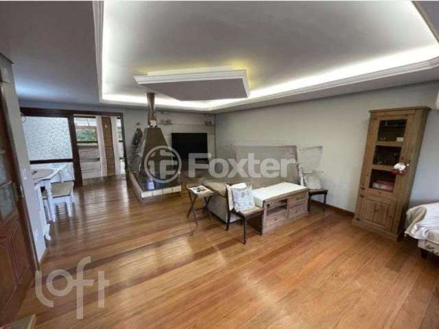 Casa com 4 quartos à venda na Avenida General Barreto Viana, 1024, Chácara das Pedras, Porto Alegre, 336 m2 por R$ 1.699.000