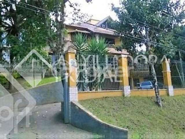 Casa com 4 quartos à venda na Avenida Coronel Marcos, 96, Pedra Redonda, Porto Alegre, 460 m2 por R$ 2.400.000