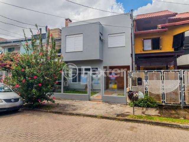 Casa em condomínio fechado com 3 quartos à venda na Rua Guatambu, 304, Hípica, Porto Alegre, 172 m2 por R$ 680.000