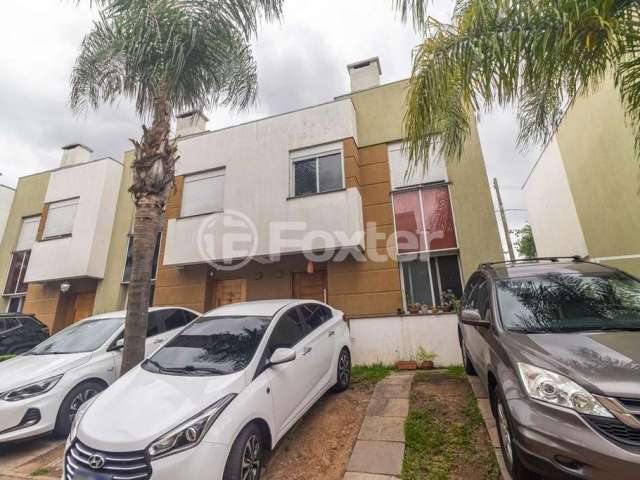 Casa com 3 quartos à venda na Rua Alberto Jerônimo Guerra, 20, Mário Quintana, Porto Alegre, 172 m2 por R$ 599.000