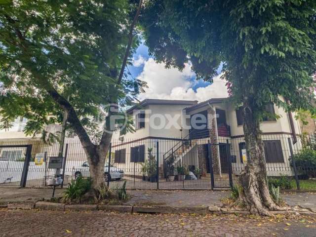 Casa com 5 quartos à venda na Rua Abílio Miller, 53, Jardim Itu Sabará, Porto Alegre, 244 m2 por R$ 850.000