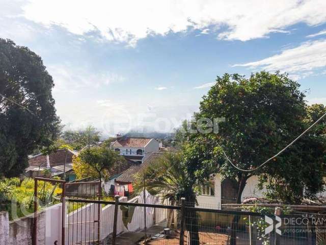 Casa com 3 quartos à venda na Rua Liberal, 1085, Tristeza, Porto Alegre, 311 m2 por R$ 800.000