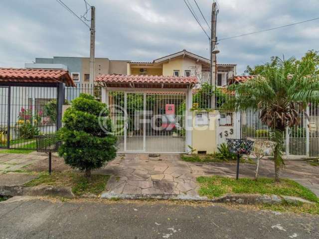 Casa com 3 quartos à venda na Rua Helio Felix Frey, 137, Espírito Santo, Porto Alegre, 126 m2 por R$ 515.000