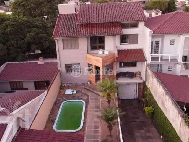 Casa com 3 quartos à venda na Rua Gregório da Fonseca, 167, Nonoai, Porto Alegre, 200 m2 por R$ 667.800