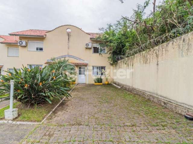 Casa em condomínio fechado com 2 quartos à venda na Avenida Edgar Pires de Castro, 350, Hípica, Porto Alegre, 118 m2 por R$ 320.000