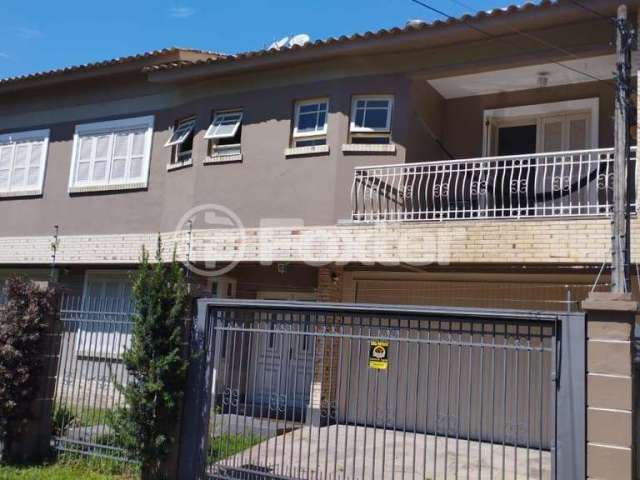 Casa com 4 quartos à venda na Rua Ari Marinho, 187, Higienópolis, Porto Alegre, 285 m2 por R$ 1.225.000