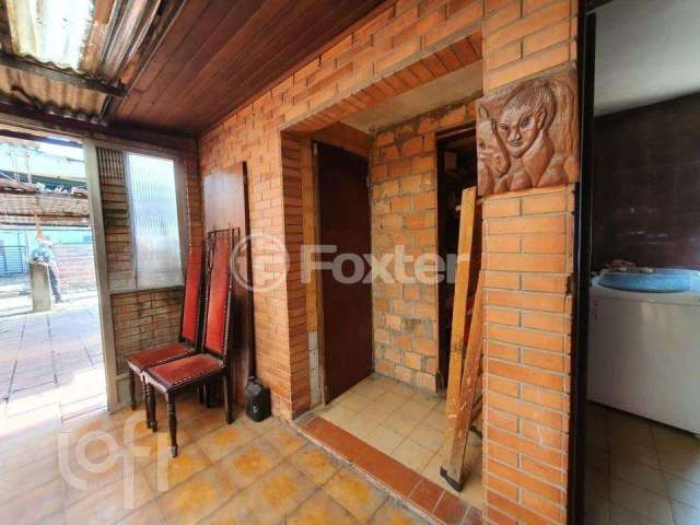 Casa com 3 quartos à venda na Rua Dona Margarida, 711, Navegantes, Porto Alegre, 240 m2 por R$ 600.000