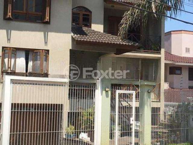 Casa com 4 quartos à venda na Rua Monte Alverne, 495, Chácara das Pedras, Porto Alegre, 450 m2 por R$ 2.180.000