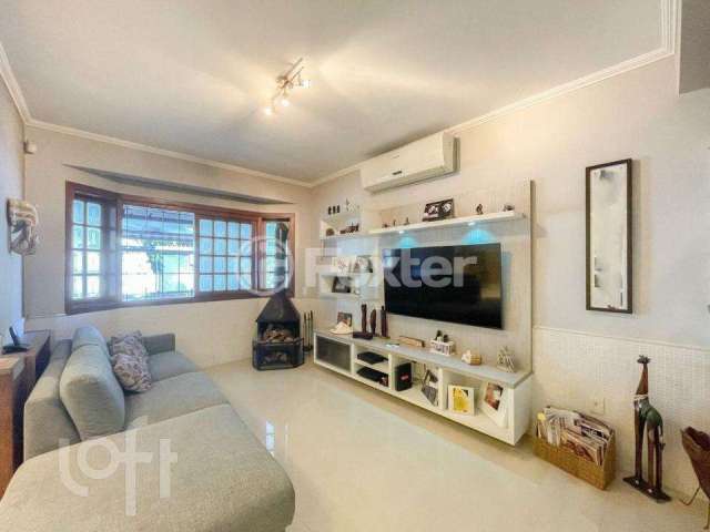 Casa com 3 quartos à venda na Avenida Copacabana, 336, Tristeza, Porto Alegre, 119 m2 por R$ 890.000