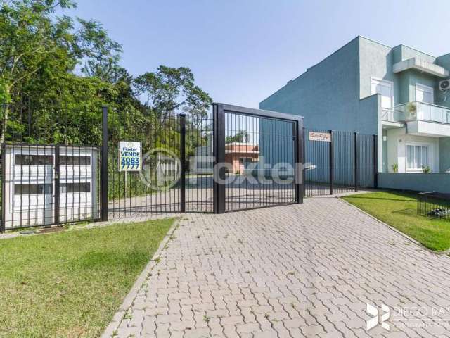 Casa em condomínio fechado com 3 quartos à venda na Rua Canísio Binsfeld, 226, Hípica, Porto Alegre, 123 m2 por R$ 645.000