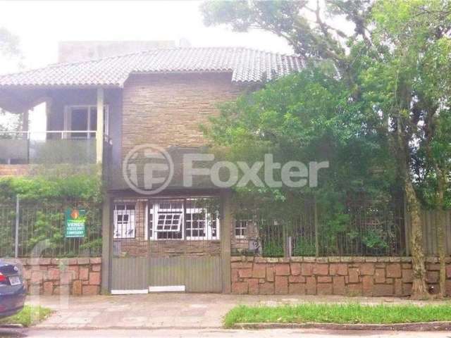 Casa com 3 quartos à venda na Avenida Beira Rio, 239, Belém Novo, Porto Alegre, 160 m2 por R$ 750.500