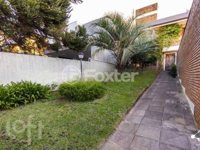 Casa com 3 quartos à venda na Rua Delfino Riet, 287, Santo Antônio, Porto Alegre, 322 m2 por R$ 1.300.000