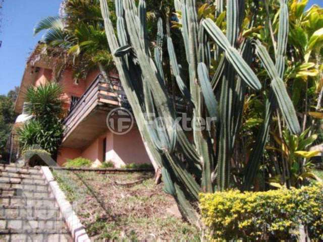 Casa com 4 quartos à venda na Rua Alcebíades Antônio dos Santos, 260, Nonoai, Porto Alegre, 240 m2 por R$ 900.000