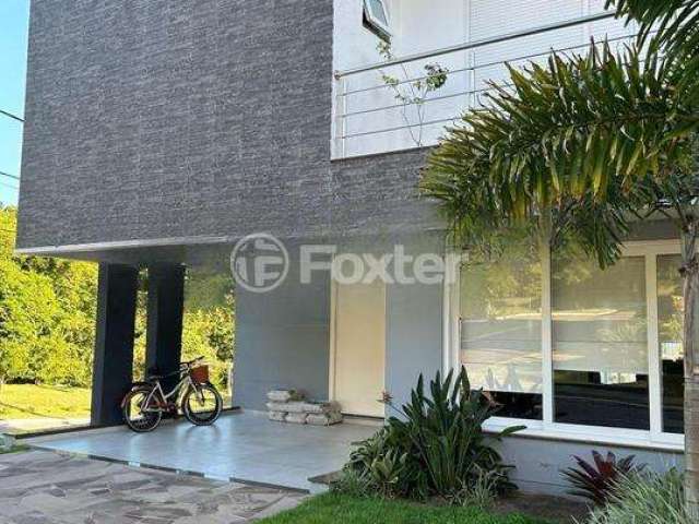 Casa em condomínio fechado com 3 quartos à venda na Rua Ivo Walter Kern, 599, Hípica, Porto Alegre, 260 m2 por R$ 1.350.000