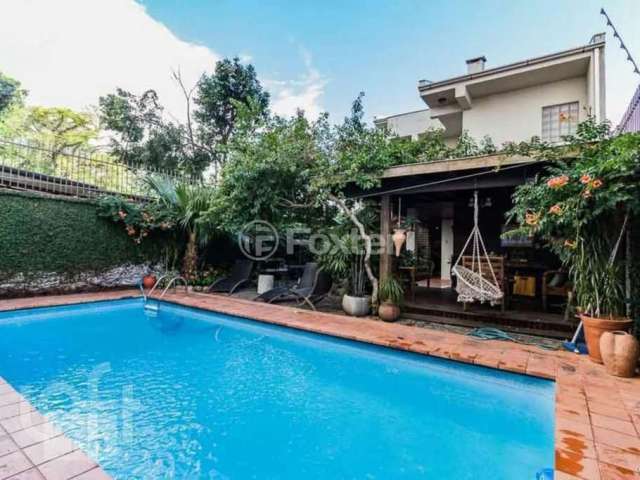 Casa com 5 quartos à venda na Rua Itaboraí, 1490, Jardim Botânico, Porto Alegre, 370 m2 por R$ 1.800.000