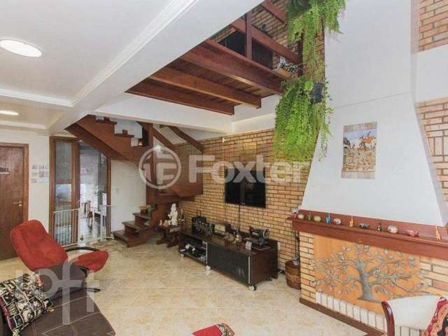 Casa com 3 quartos à venda na Avenida Copacabana, 358, Tristeza, Porto Alegre, 177 m2 por R$ 1.195.000