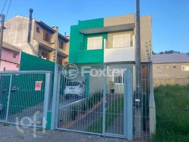 Casa com 2 quartos à venda na Rua Doutor Cláudio Walter Ferreira da Silva, 176, Guarujá, Porto Alegre, 108 m2 por R$ 350.000