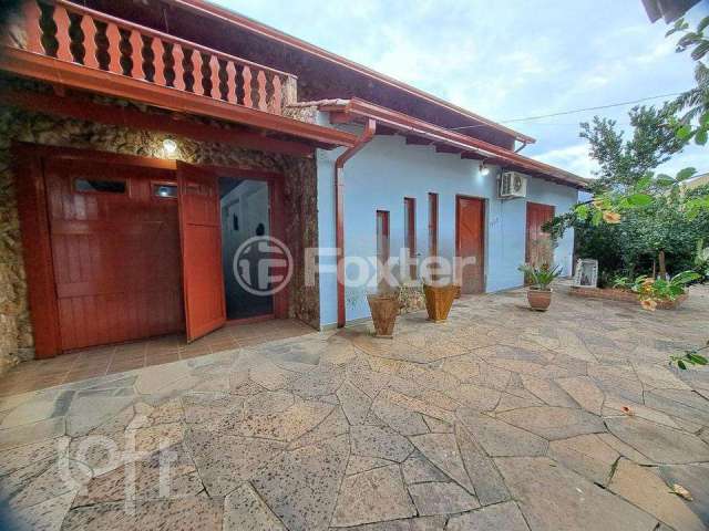 Casa com 4 quartos à venda na Rua das Araras, 1650, Harmonia, Canoas, 371 m2 por R$ 841.000