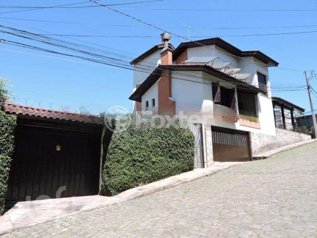 Casa com 3 quartos à venda na Rua Sarmento Leite, 2701, Exposição, Caxias do Sul, 239 m2 por R$ 1.100.000