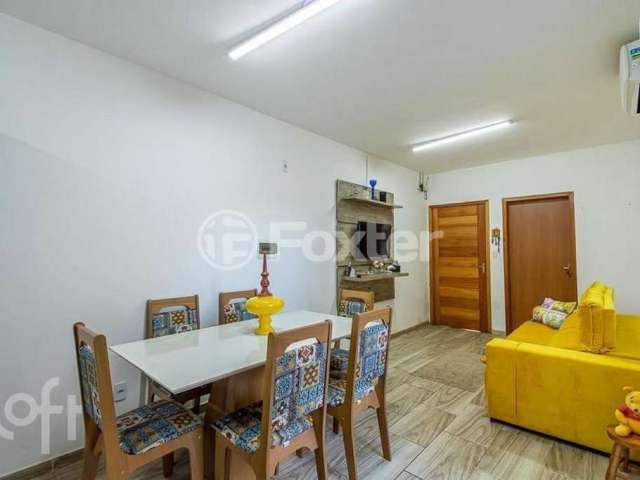 Casa com 2 quartos à venda na Avenida do Comércio, 240, Morada do Vale II, Gravataí, 56 m2 por R$ 248.000